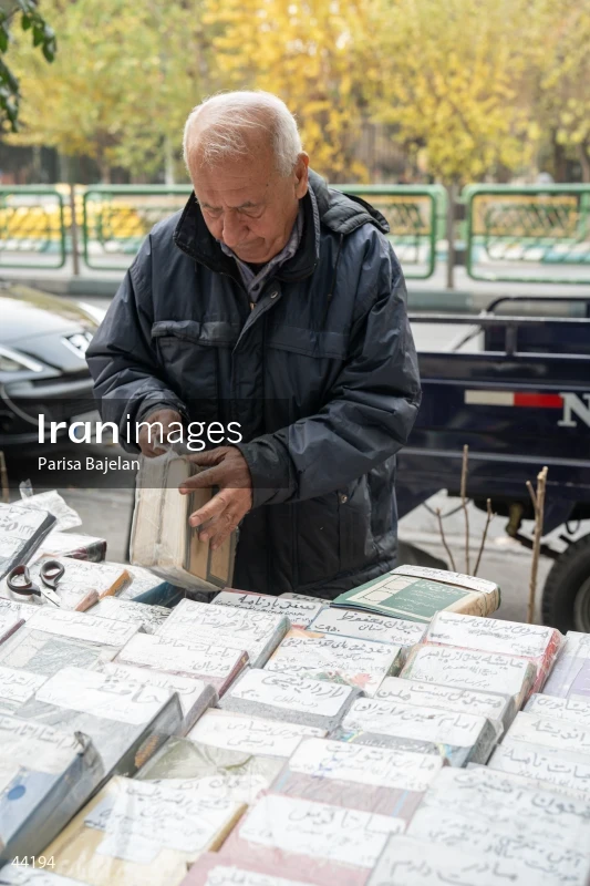Elderly Bookseller at Enghelab Square