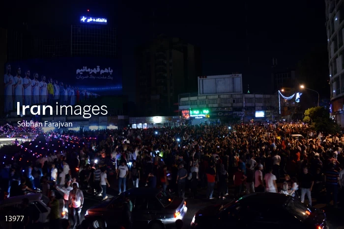 Iranian fans celebrate victory against Morocco