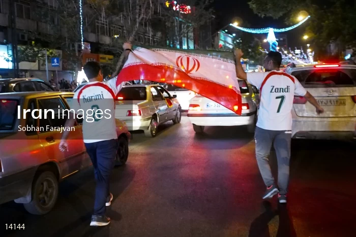 Iranian fans celebrate victory against Morocco