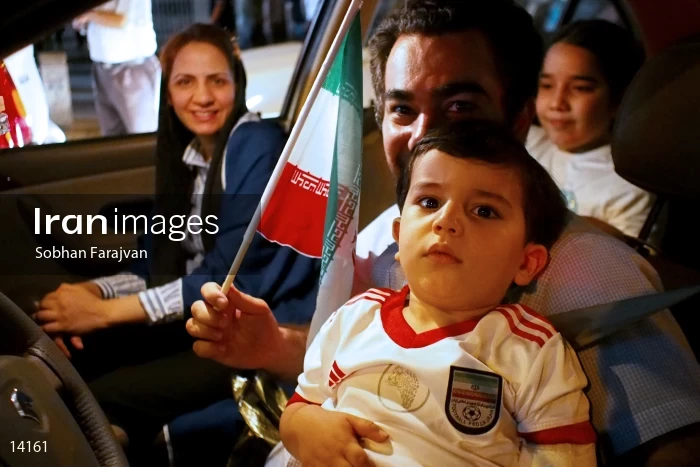 Iranian fans celebrate victory against Morocco
