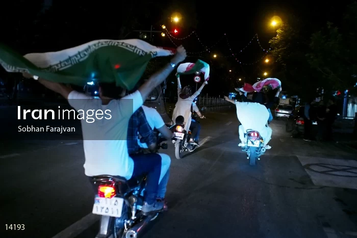 Iranian fans celebrate victory against Morocco