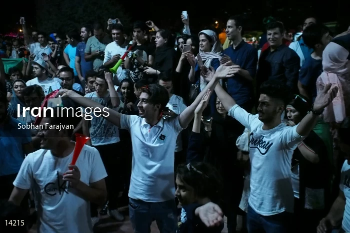 Iranian fans celebrate victory against Morocco