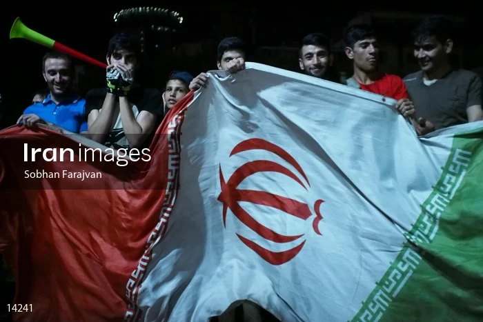 Iranian fans celebrate victory against Morocco