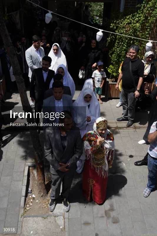 Marriage ceremony of 14 Turkmen couples in Tehran