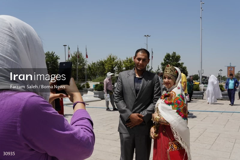 Marriage ceremony of 14 Turkmen couples in Tehran