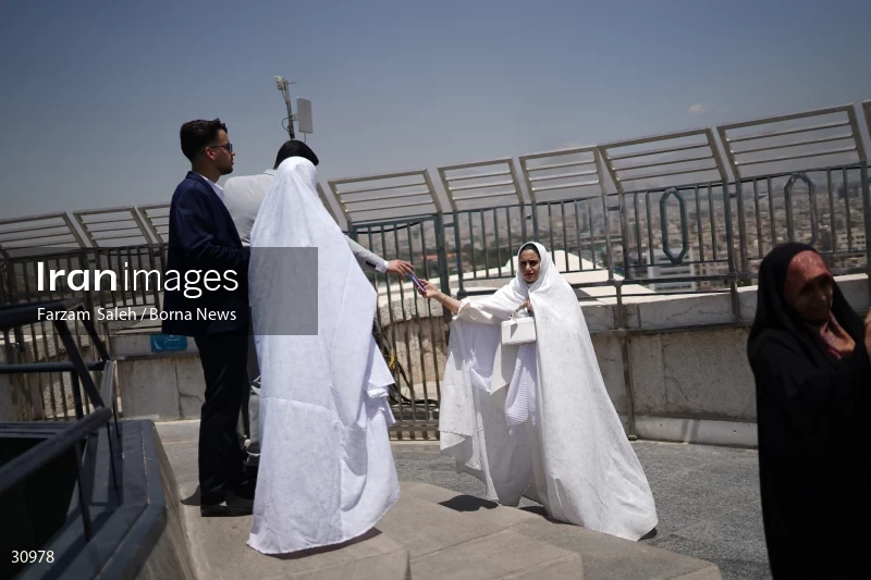 Marriage ceremony of 14 Turkmen couples in Tehran