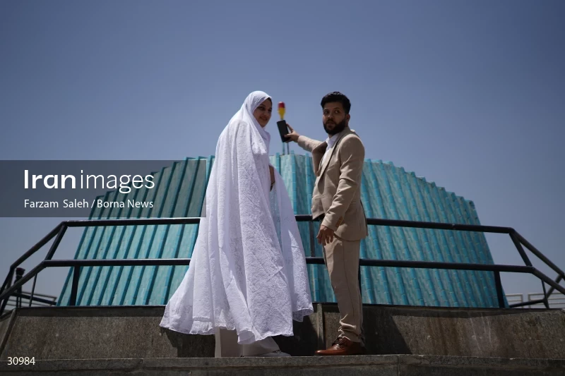 Marriage ceremony of 14 Turkmen couples in Tehran