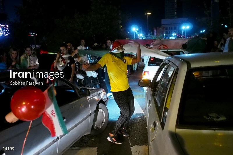 Iranian fans celebrate victory against Morocco