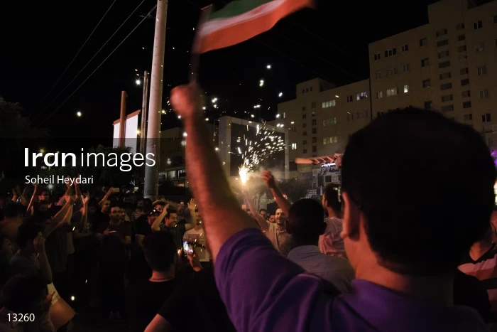 Celebration of the Iranian people after winning the Iranian soccer team against Morocco
