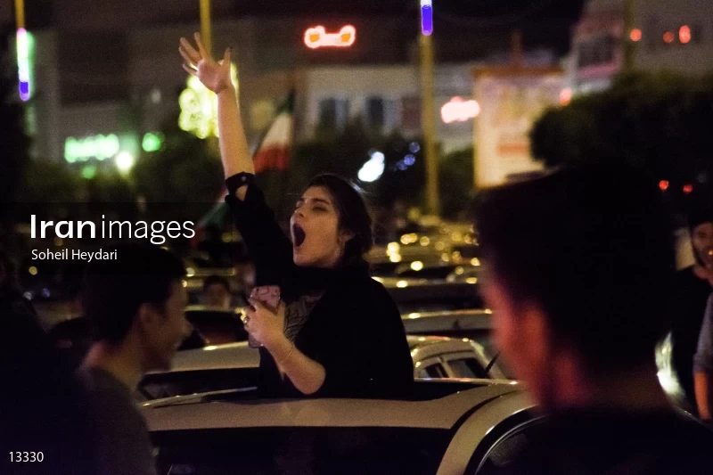 Celebration of the Iranian people after winning the Iranian soccer team against Morocco