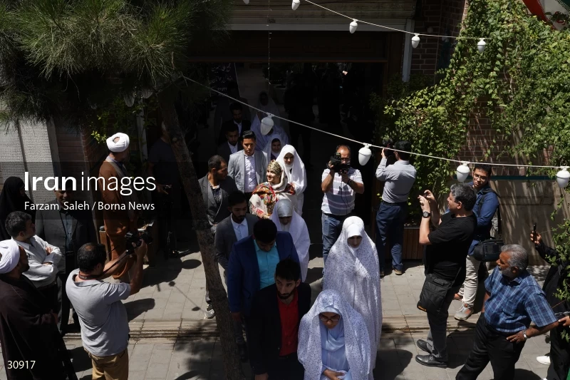 Marriage ceremony of 14 Turkmen couples in Tehran