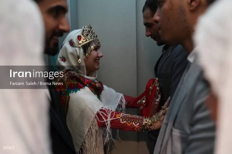 Marriage ceremony of 14 Turkmen couples in Tehran