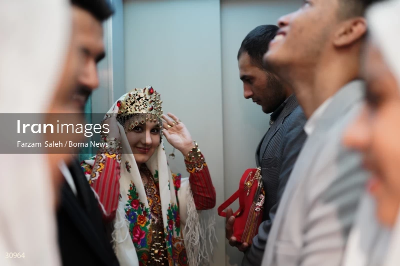 Marriage ceremony of 14 Turkmen couples in Tehran