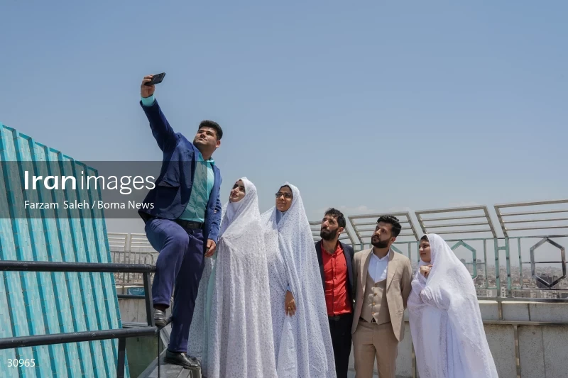 Marriage ceremony of 14 Turkmen couples in Tehran