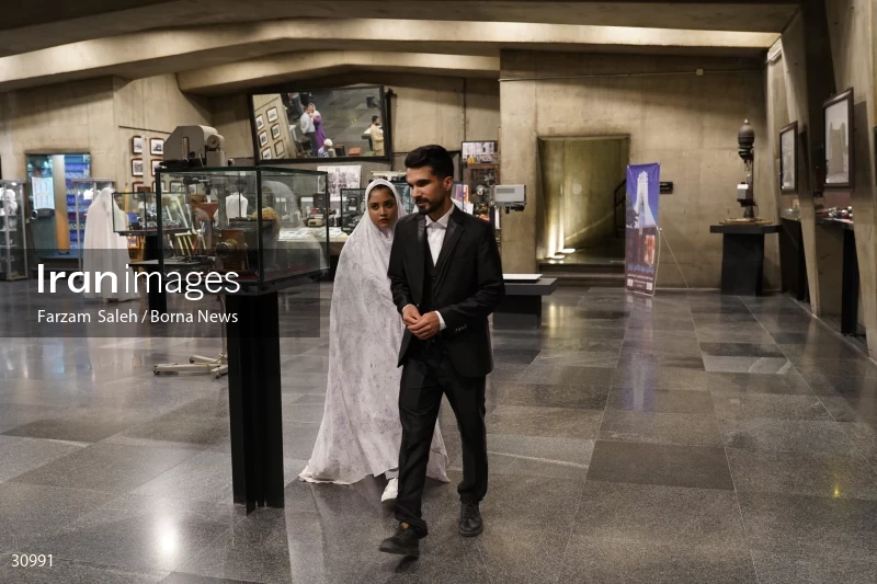Marriage ceremony of 14 Turkmen couples in Tehran