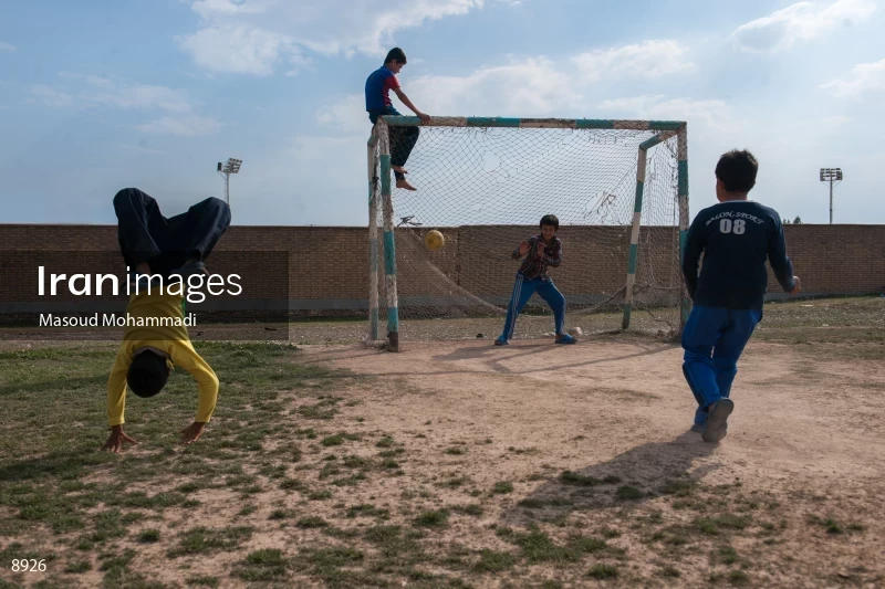 Children Play Football in Andimeshk Outskirts