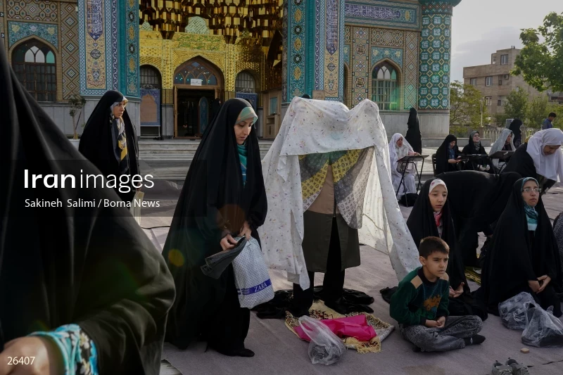 Iranians perform Eid al-Fitr prayers in Tehran