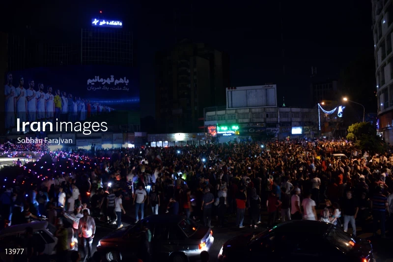 Iranian fans celebrate victory against Morocco