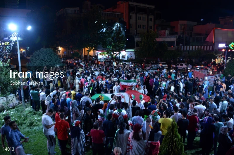 Iranian fans celebrate victory against Morocco