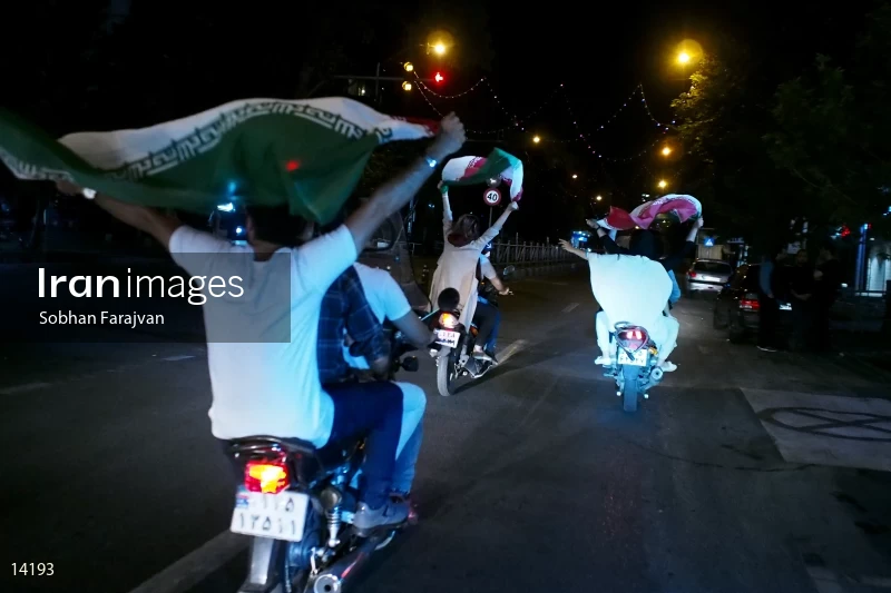 Iranian fans celebrate victory against Morocco