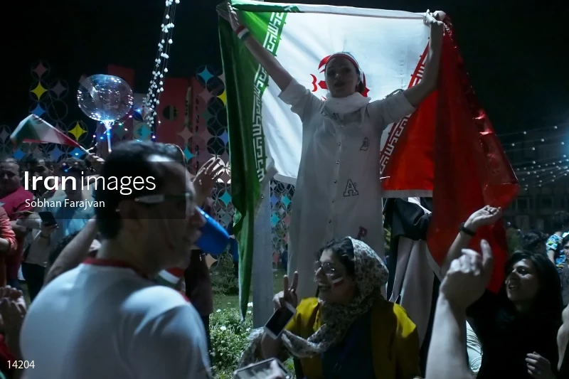 Iranian fans celebrate victory against Morocco