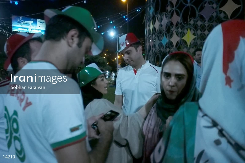 Iranian fans celebrate victory against Morocco