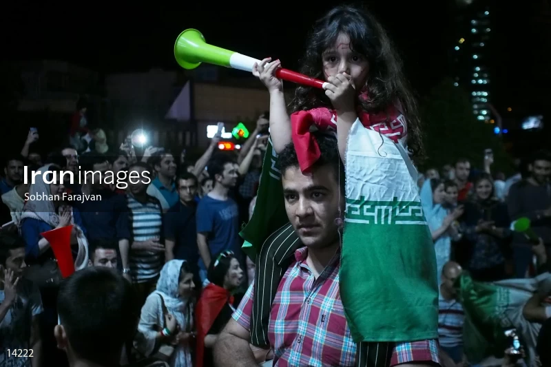Iranian fans celebrate victory against Morocco