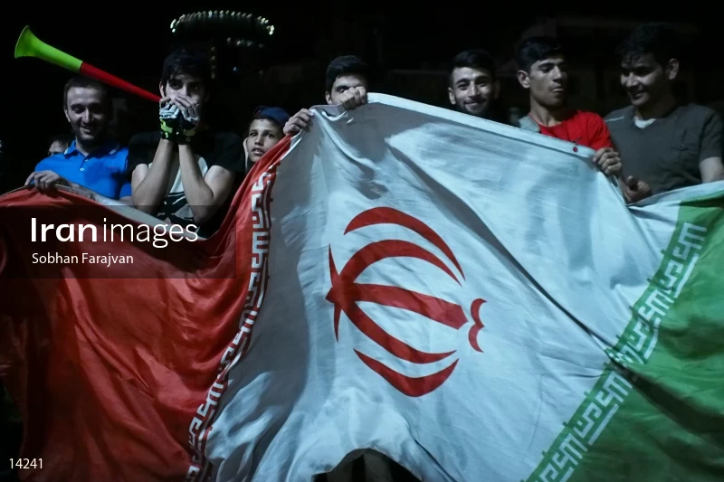 Iranian fans celebrate victory against Morocco