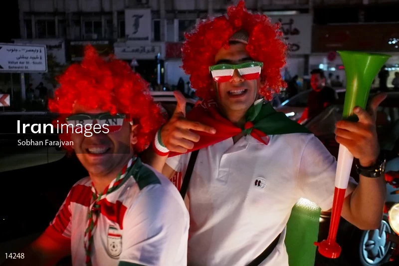 Iranian fans celebrate victory against Morocco