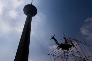 Stunt jumping beside The Milad Tower