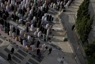 Iranians perform Eid al-Fitr prayers in Tehran