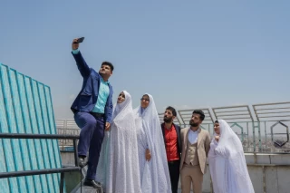 Marriage ceremony of 14 Turkmen couples in Tehran